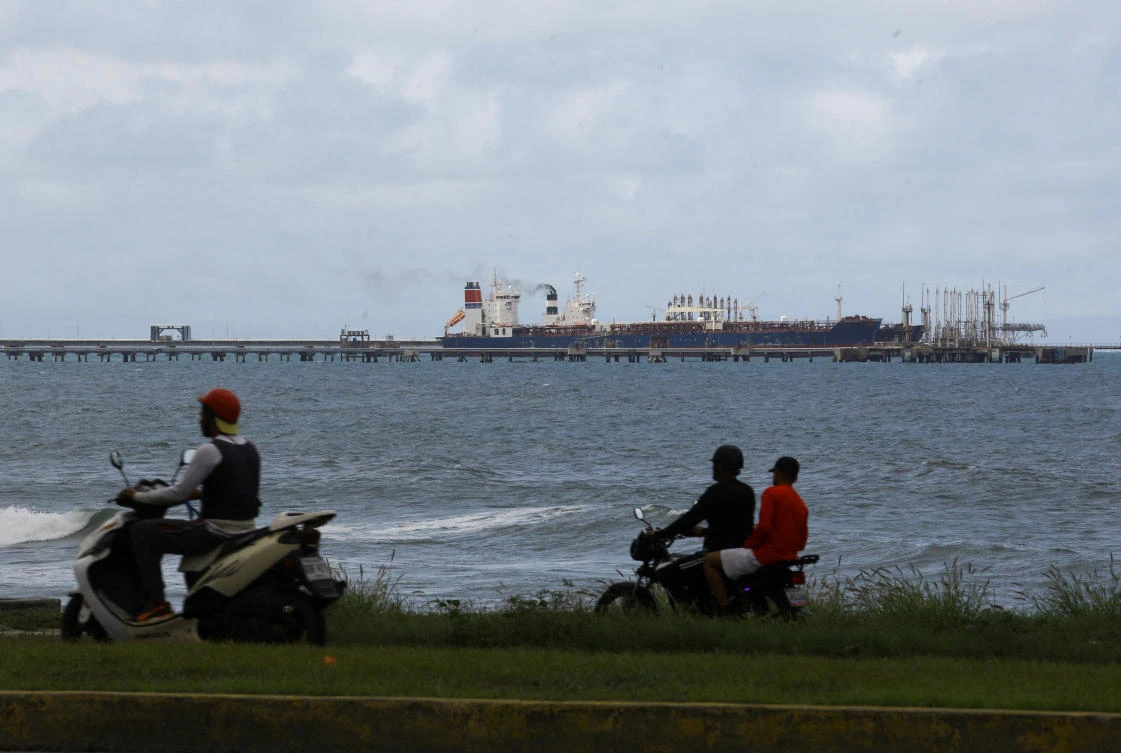 The Guinea-flagged oil tanker MT Bandra, which is under sanctions, is partially seen alongside another vessel at El Palito terminal, near Puerto Cabello, Venezuela Dec. 29, 2025. (Reuters/File)