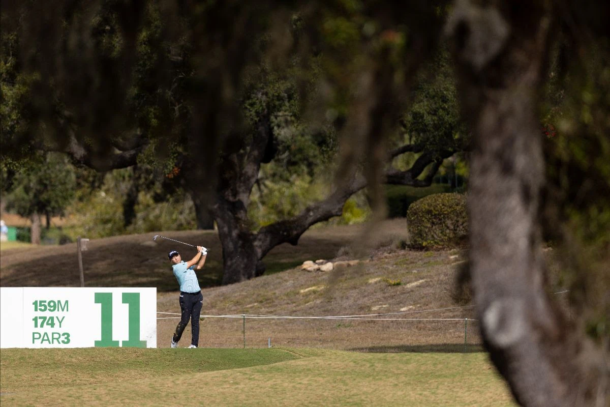 Anthony Kim hits his shot from a bunker on the 13th hole during the third round of the LIV Golf Promotions at Black Diamond Ranch on Saturday (LIV Golf)