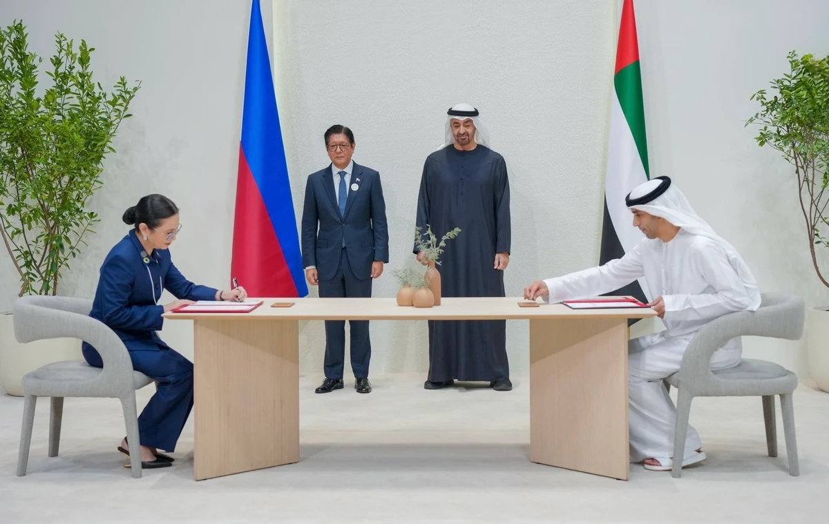Philippine President Ferdinand R. Marcos Jr. and UAE President Sheikh Mohamed bin Zayed witness the signing of the Philippines-UAE Comprehensive Economic Partnership Agreement in Abu Dhabi, Jan. 13, 2026. (Office of the President of the Philippines)