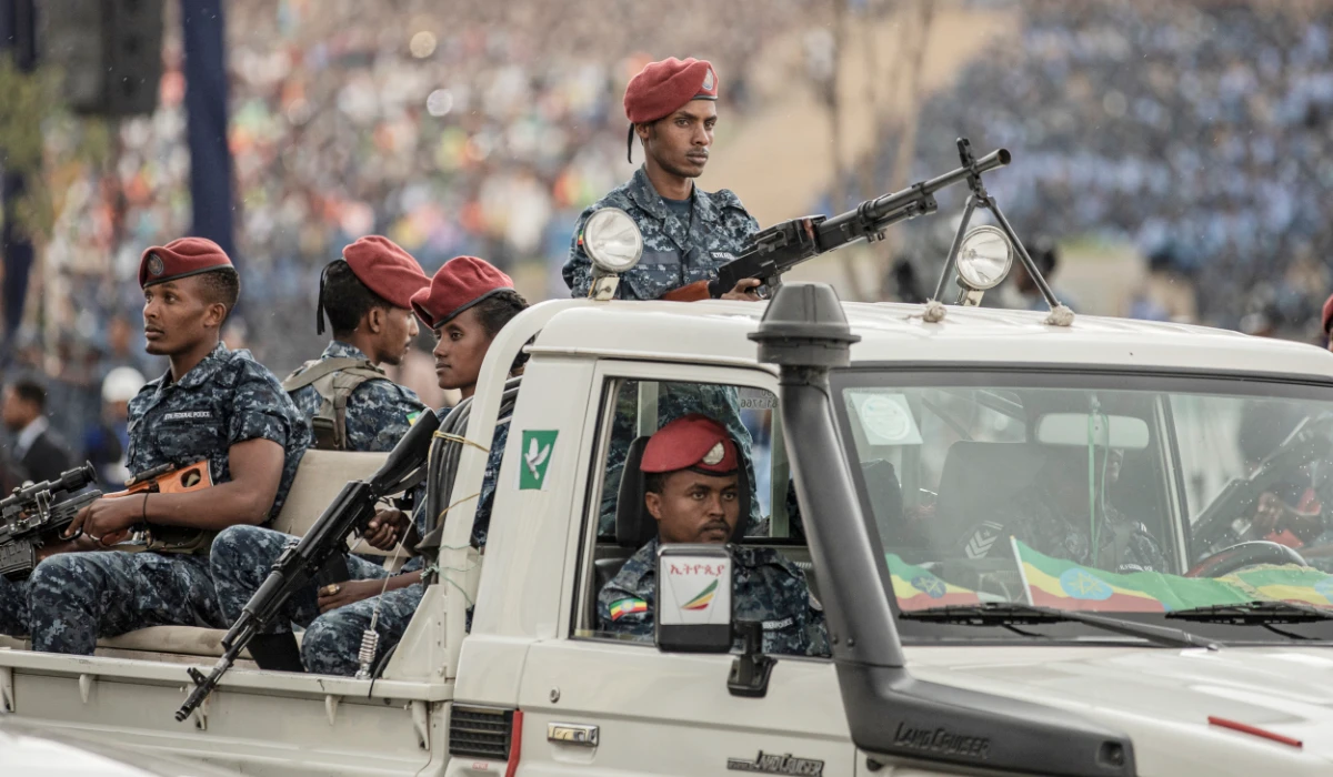 An Ethiopian Federal Police officers pass by during a ceremony of honoring members of the Federal Police Force in Addis Ababa, Ethiopia, on June 5, 2022. (AFP)