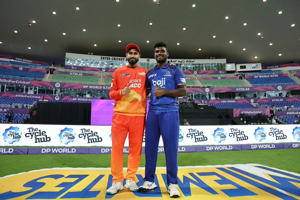 Meet Bhavsar (left) of Gulf Giants and Mohammed Shafeeq of MI Emirates during the post-match presentation ceremony of Match 26 of the DP World ILT20 at the Zayed Cricket Stadium in Abu Dhabi on Dec. 23, 2025. (CREIMAS / ILT20)