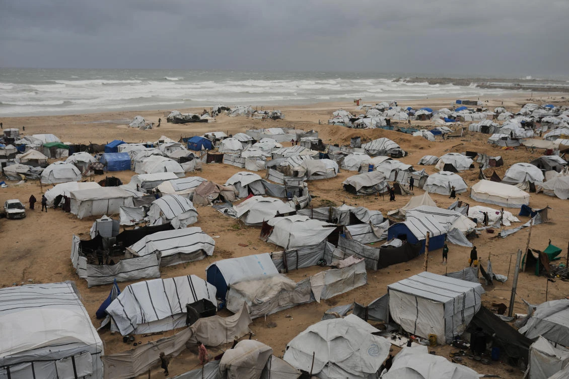 A displacement camp sheltering Palestinians on a beach amid stormy weather in Gaza City on Tuesday. (AP)