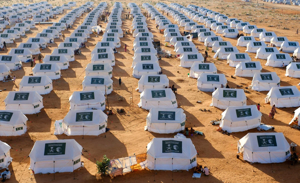 Tents display the logo of the Kingdom of Saudi Arabia at a displaced persons camp in El Obeid, North Kordofan State, Sudan, on Monday. (Reuters)