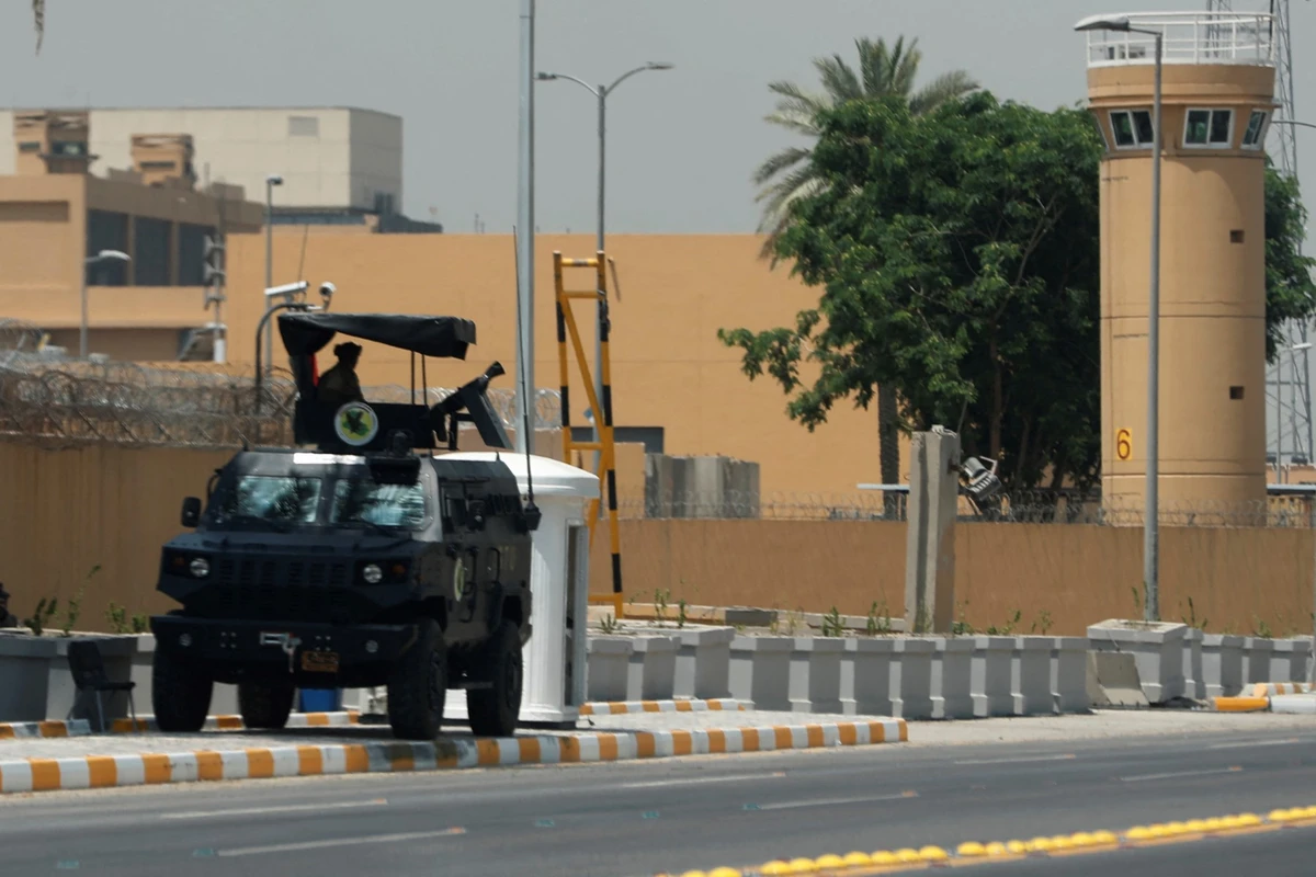Armoured vehicles of the Iraqi Counter Terrorism Forces are deployed outside the US embassy in Baghdad’s Green Zone, June 12, 2025. (AFP)