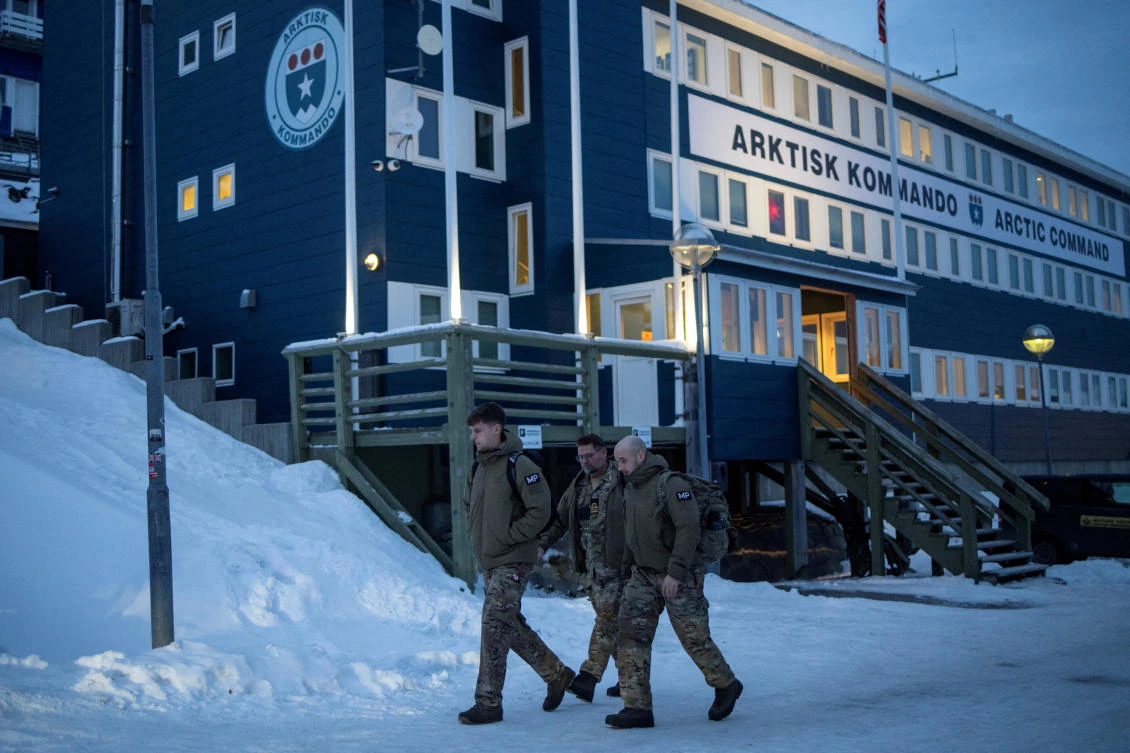 Above, Danish soldiers walk in front of Joint Arctic Command in Nuuk, Greenland on Jan. 16, 2026. (Reuters)