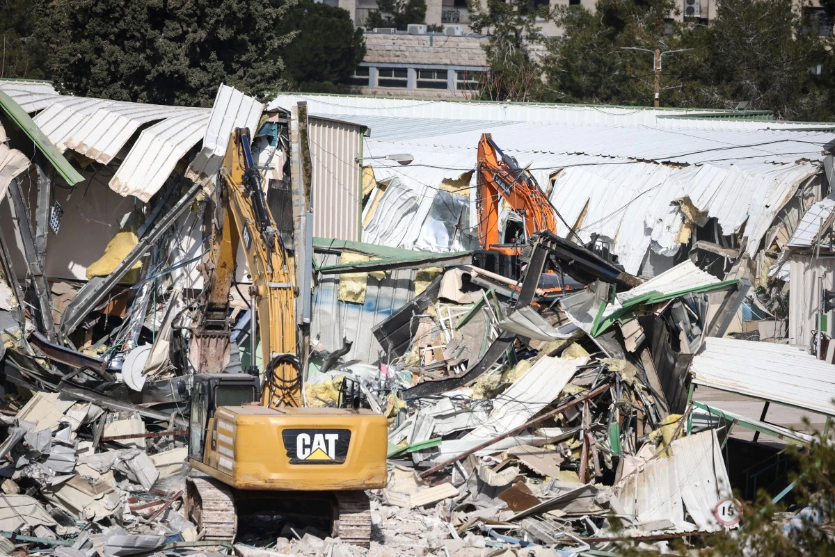 A photograph shows machinery demolishing a structure inside the headquarters of UNRWA in the Sheikh Jarrah neighbourhood in occupied East Jerusalem, Jan. 20, 2026. (AFP)