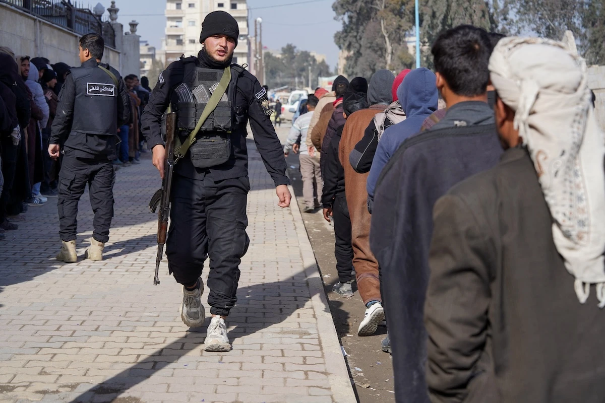 Syrian government, Kurdish forces announce integration deal