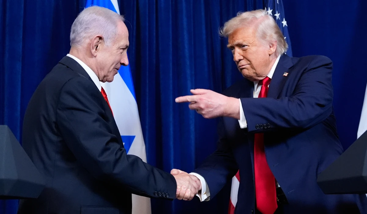 President Donald Trump shakes hands with Israel's Prime Minister Benjamin Netanyahu in Palm Beach, Fla. (AP)