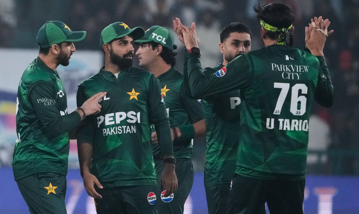 Pakistan's Abrar Ahmed, second right, celebrates with teammate after the dismissal of Australia's Mitchell Marsh during the second T20 cricket match between Pakistan and Australia, in Lahore, Pakistan, Saturday, Jan. 31, 2026. (AP)