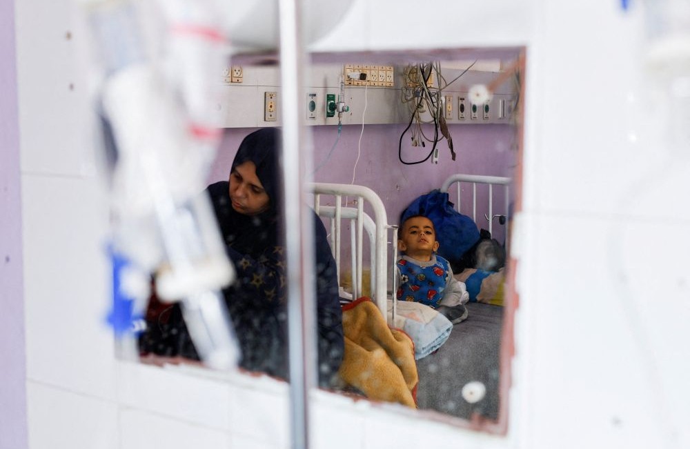 A Palestinian boy, Nidal Abu Rabee, receives treatment at Al-Aqsa Martyrs Hospital, in Deir Al-Balah, central Gaza Strip, Feb. 2, 2026. (Reuters)