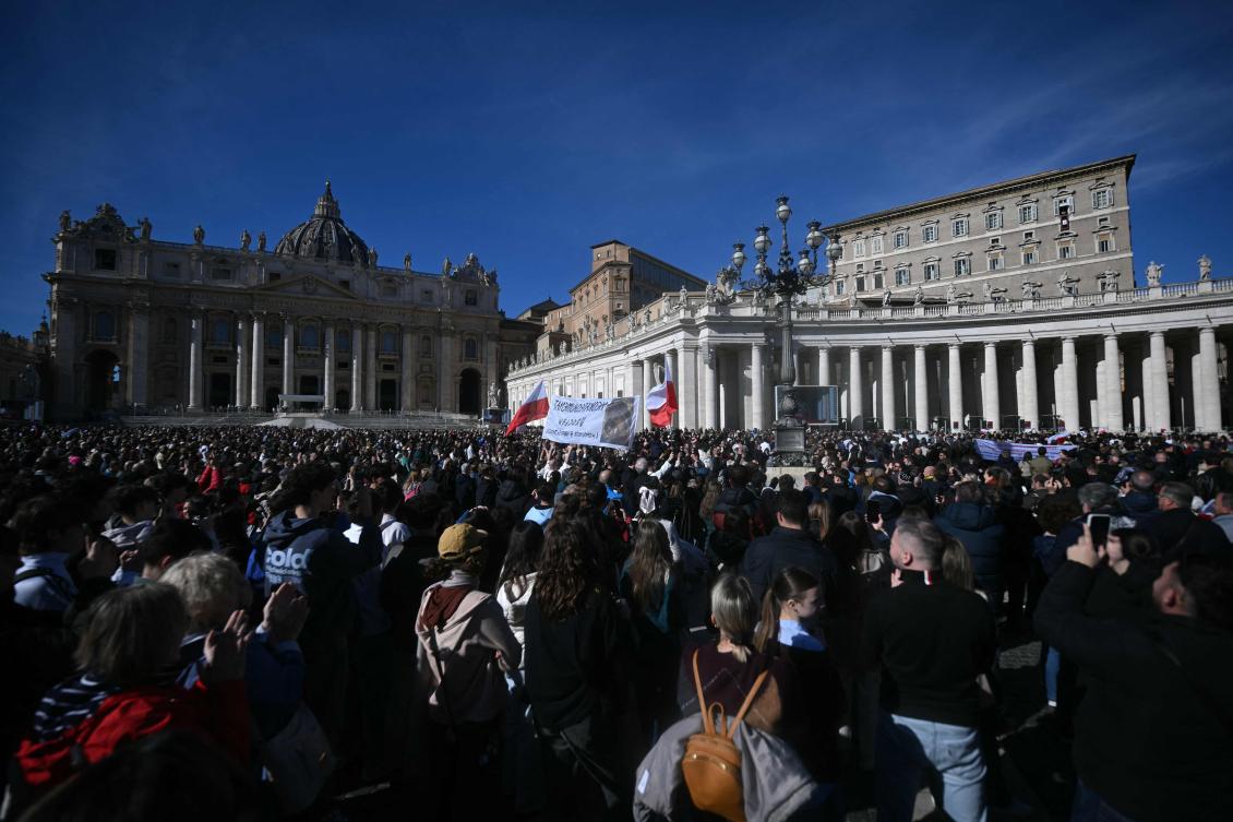 Pope Leo XIV addresses the crowd from the window of the apostolic palace overlooking St. Peter's square during the Angelus prayer in The Vatican on February 1, 2026. (AFP)