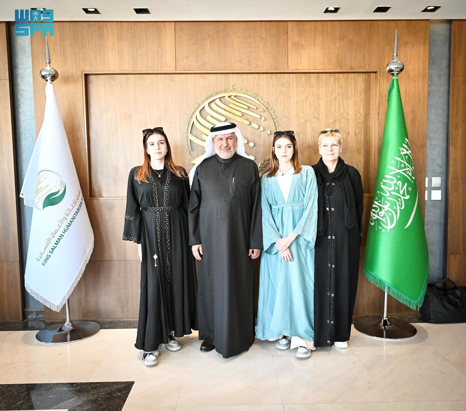 KSrelief chief Dr. Abdullah Al-Rabeeah meets with Polish former conjoined twins Olga and Daria in Riyadh. (SPA)