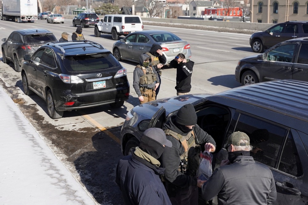 US Federal immigration agents conduct immigration enforcement tasks in Minneapolis, Minnesota. (Reuters)