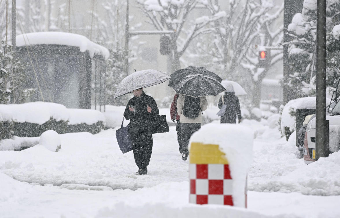 As of Wednesday, 15 prefectures have been affected, with the amount of snow piled up in the worst hit areas estimated to have reached 2 meters. (Kyodo News via AP)