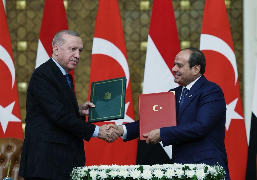 Turkish President Recep Tayyip Erdogan shakes hands with Egyptian President Abdel Fattah El-Sisi in Cairo on Wednesday. (@trpresidency)