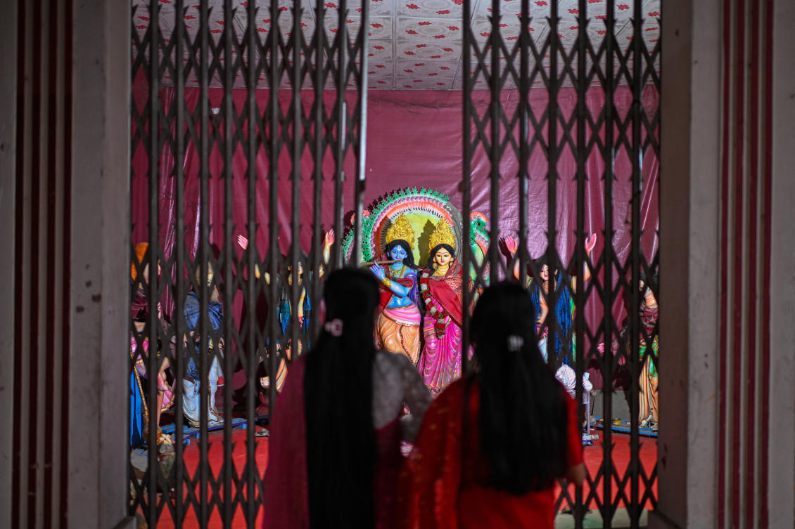 Hindu worshippers offer prayers at Ramna Kali Temple in Dhaka. Fear has grown more pervasive among Hindus as Muslim-majority Bangladesh moves toward a national election on Feb. 12. (AP)