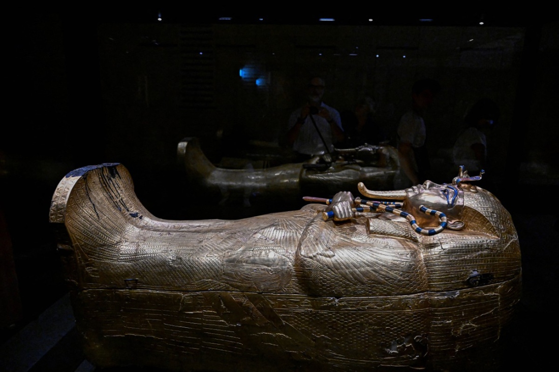 The sarcophagus of ancient Egyptian King Tutankhamun is displayed inside the Tutankhamun Gallery at the Egyptian Grand Museum near the Giza pyramids in Cairo, Egypt. (AFP)