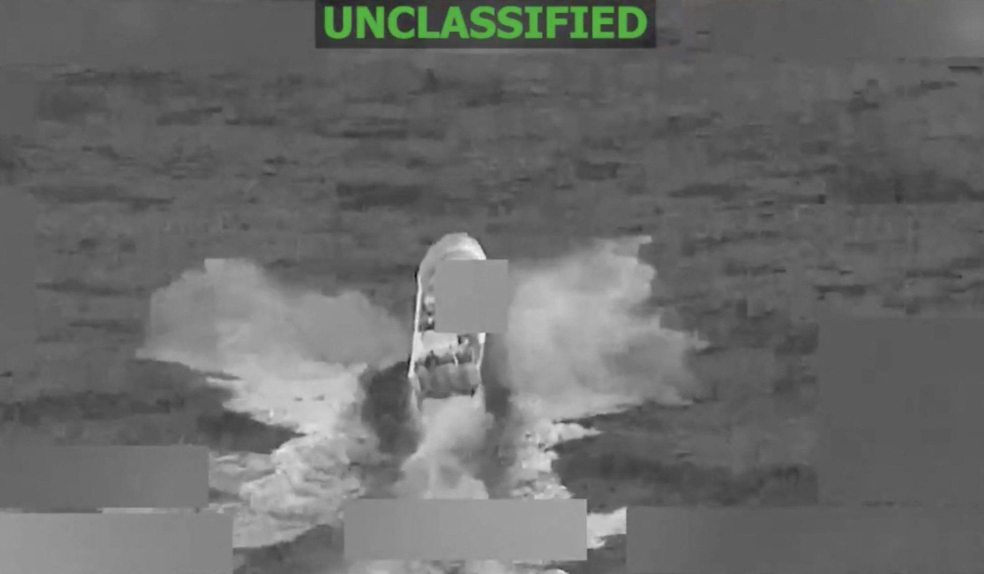 A screengrab from a video posted on the X account of US Southern Command on Feb. 5, 2026 shows a vessel before it was struck while allegedly transiting along narco-trafficking routes in international waters. (US Southern Command/AFP)