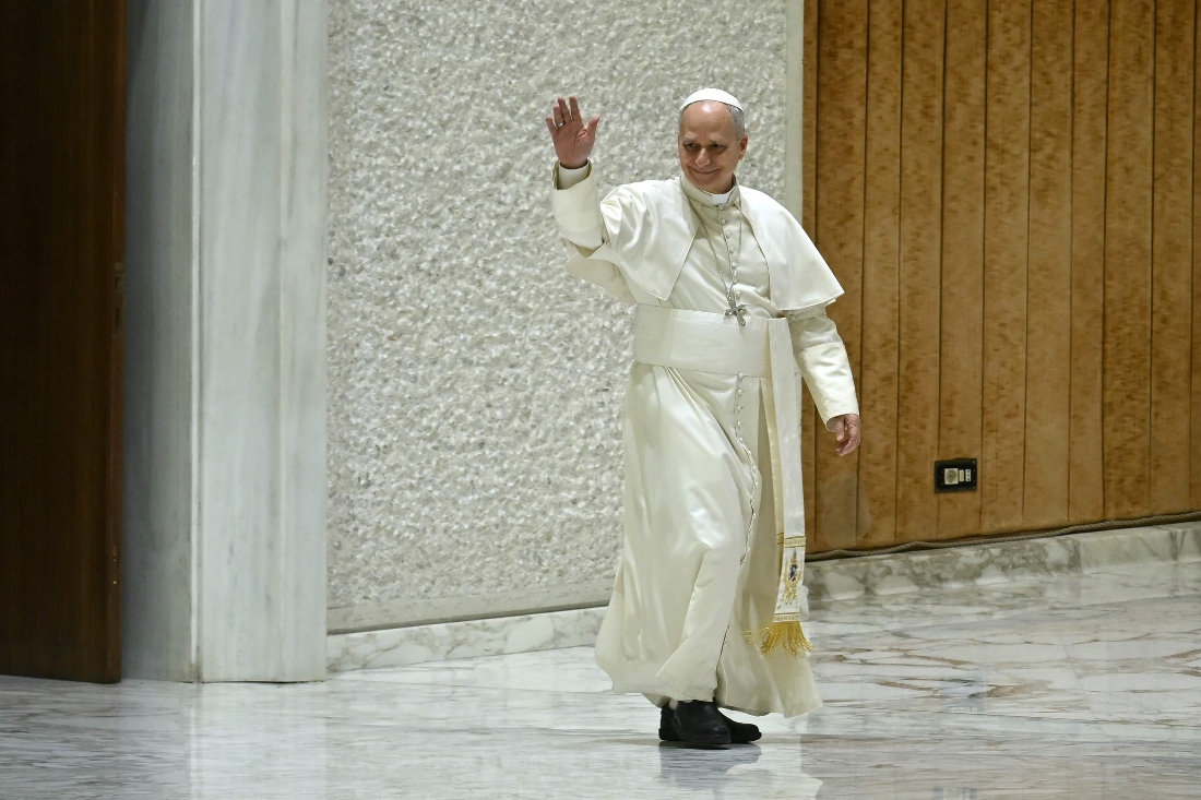 Pope Leo XIV waves as he arrives for a weekly general audience, at Paul-VI hall in The Vatican, Rome. (AFP)