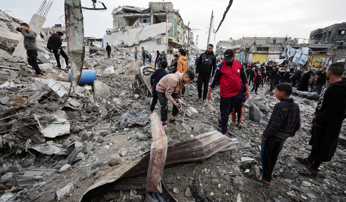Palestinians inspect a building hit by an Israeli strike on Friday, in Gaza City, February 6, 2026. (REUTERS)