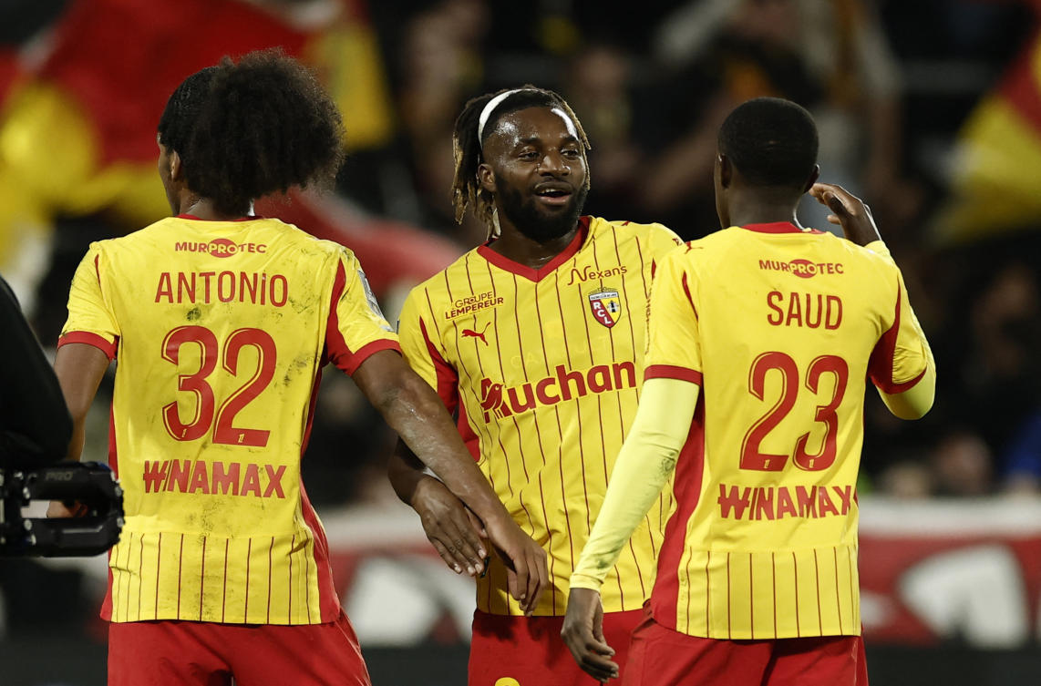 RC Lens’ Allan Saint-Maximin, Kyllian Antonio and Saud Abdulhamid celebrate after their Ligue 1 match against Stade Rennes — Stade Bollaert-Delelis, Lens, France — Feb. 7, 2026. (Reuters)
