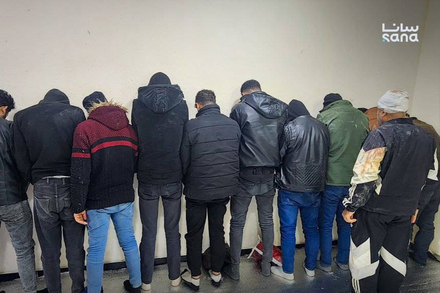 Some of the arrested members of the busted smuggling ring are shown in this picture taken at a temporary detention center in Tartus. (SANA photo)