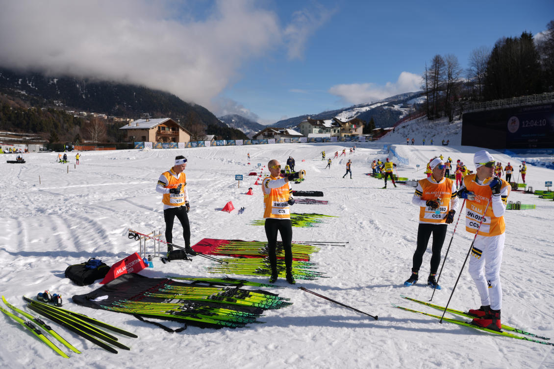 Sweden team staff check the course during a cross country training session at the 2026 Winter Olympics, in Tesero, Italy, Thursday, Feb. 5, 2026. (AP Photo/Evgeniy Maloletka)