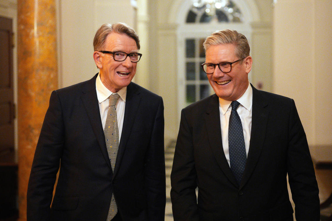 British Prime Minister Keir Starmer talks with the then ambassador to the US Peter Mandelson during a visit to Washington last year. (AP)