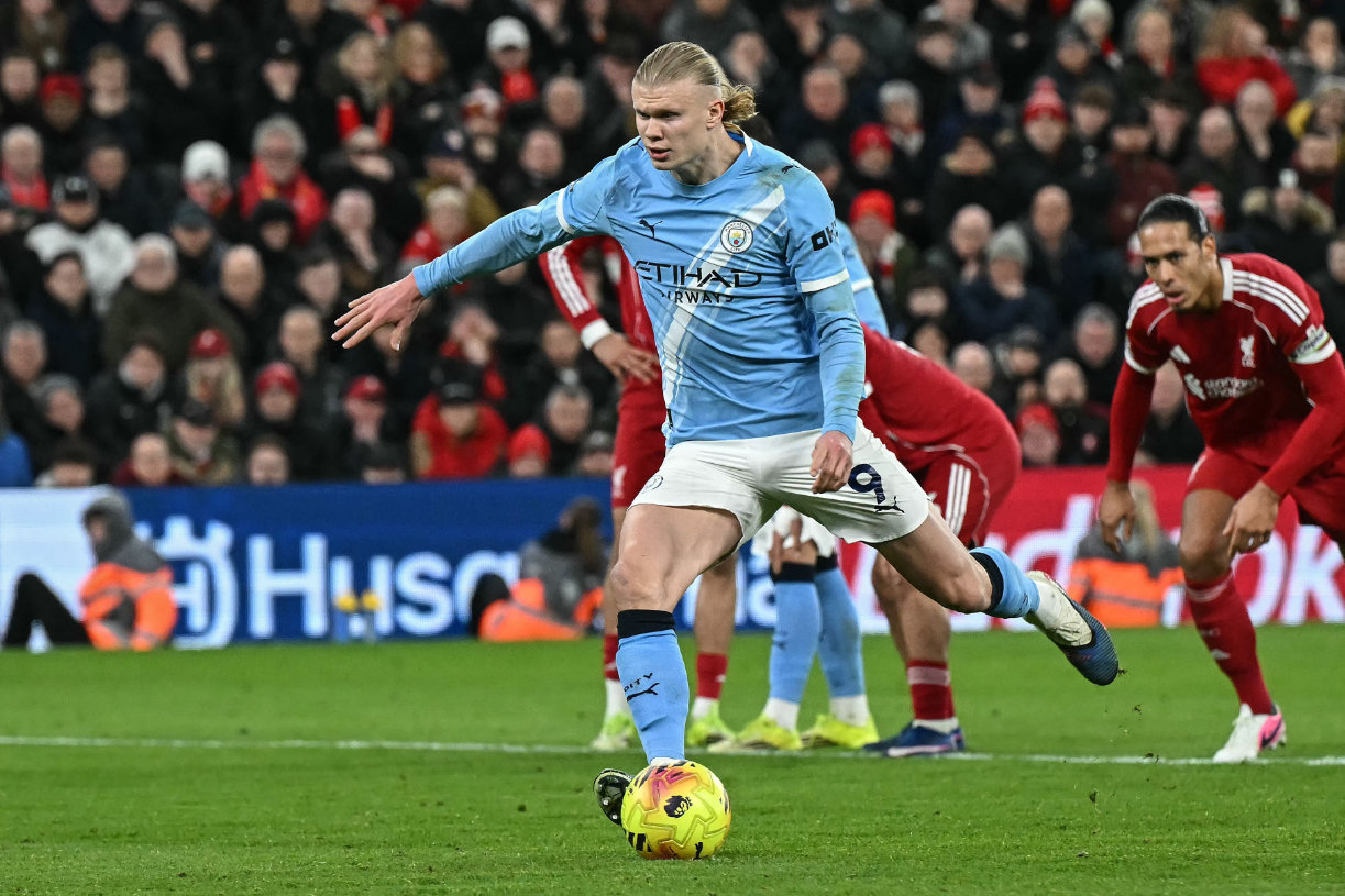 Manchester City's Norwegian striker #09 Erling Haaland (C) scores his team's second goal during the English Premier League football match between Liverpool and Manchester City at Anfield in Liverpool, north west England on February 8, 2026. (AFP)