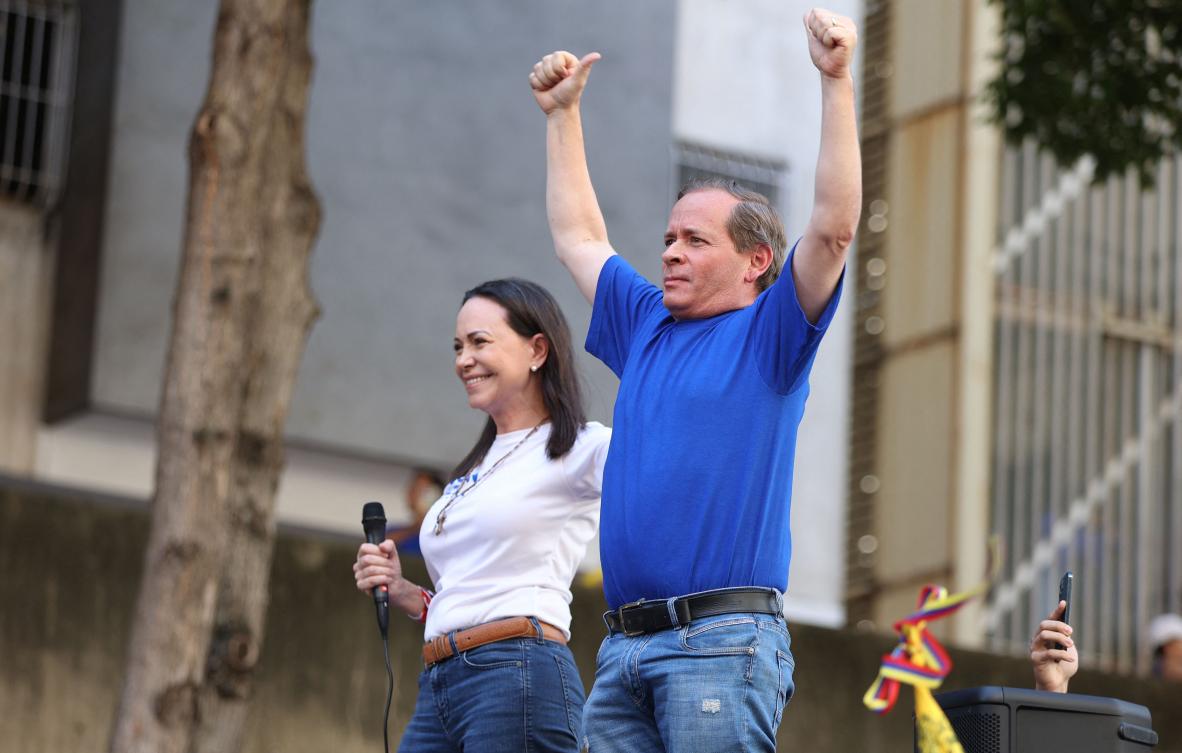 Former Deputy of the National Assembly of Venezuela, Juan Pablo Guanipa (R) gestures next to Venezuelan opposition leader Maria Corina Machado during a protest called by the opposition on the eve of the presidential inauguration in Caracas. (File / AFP)