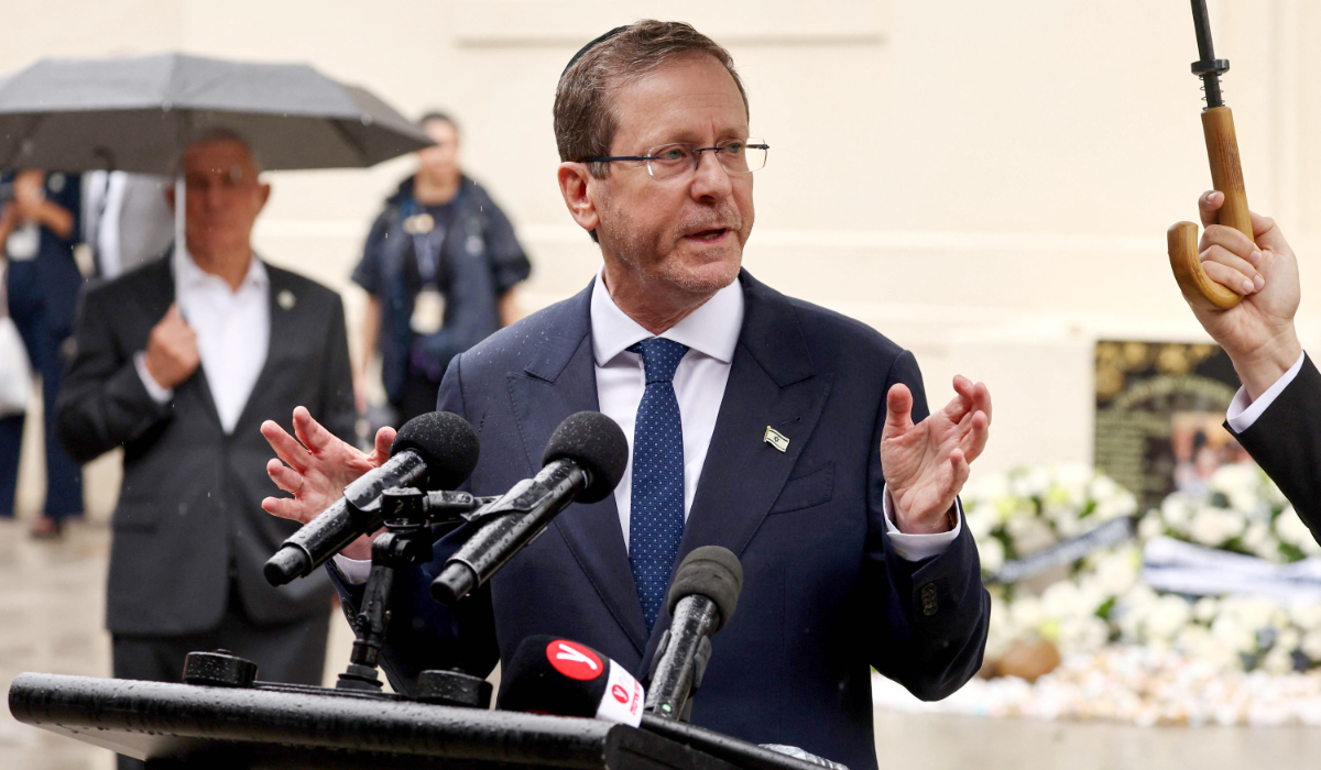 Israeli President Isaac Herzog speaks after laying a wreath for victims of the December 14, 2025 gun attack at the Bondi Pavilion, in Sydney on February 9, 2026. (AFP)