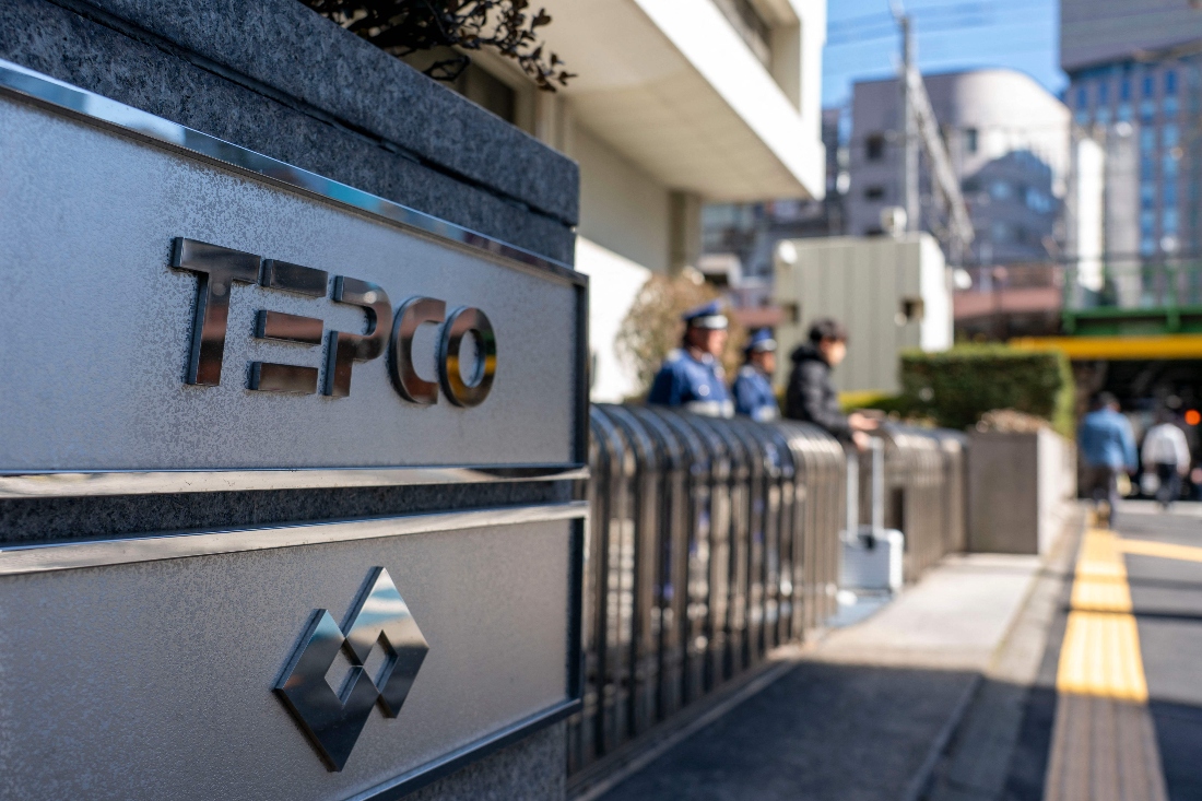 The logo of Tokyo Electric Power Company is seen at an entrance to the company's headquarters in Tokyo, Japan. (AFP)