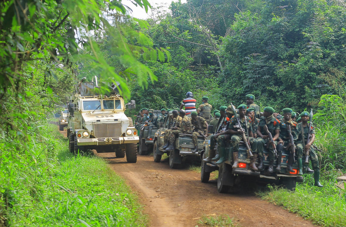 Congolese Defense Forces soldiers and United Nation forces patrol the area of an attack near the town of Oicha, 30km from Beni, Democratic Republic of Congo in 2021. (AP/File)