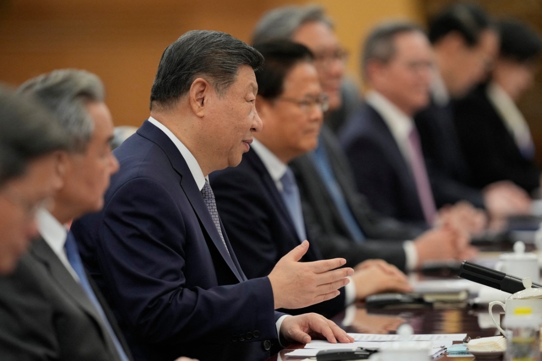 China's President Xi Jinping speaks during a meeting with Britain's Prime Minister Keir Starmer at the Great Hall of the People in Beijing, China. (AFP)