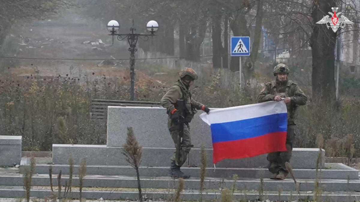 FILE PHOTO: Soldiers hold a Russian flag in Pokrovsk, Donetsk Region, Ukraine, in this screengrab from video released December 1, 2025.(Reuters)