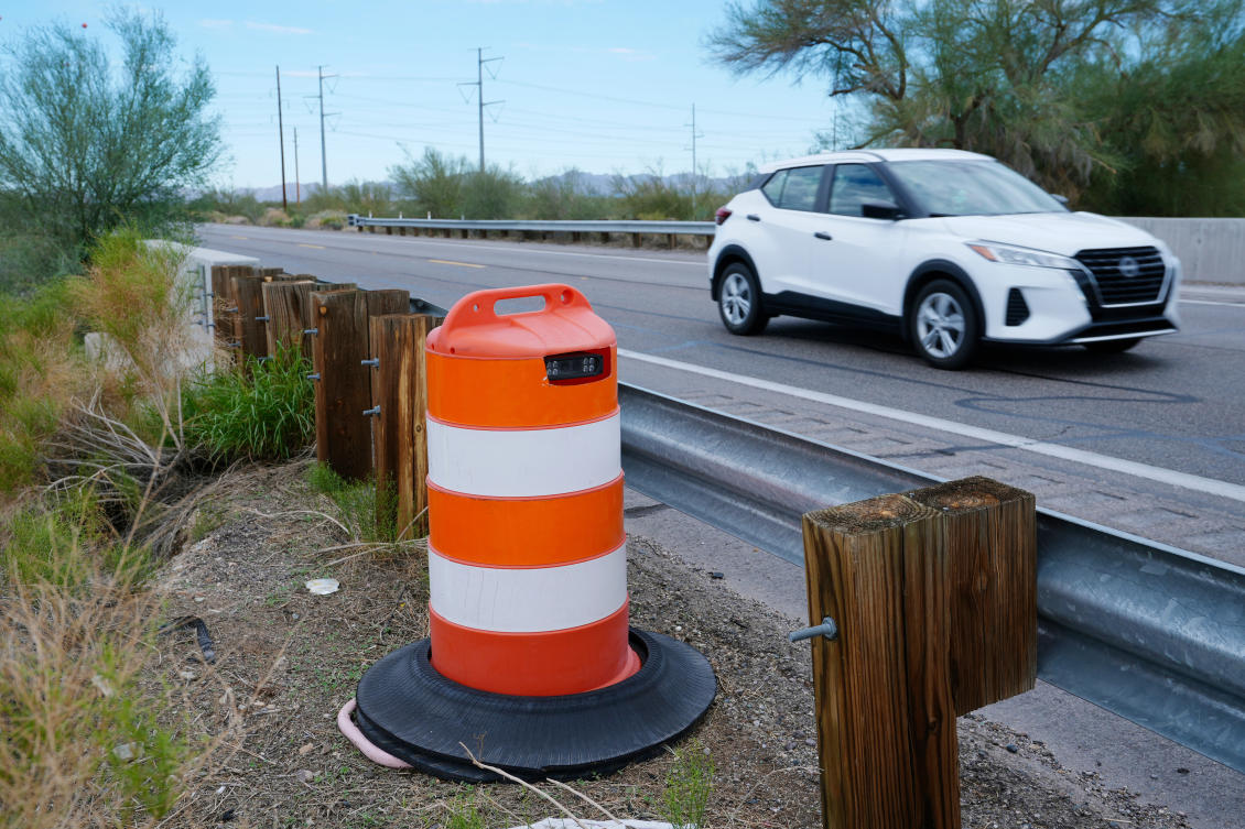 Above, a license plate reader used by US Border Patrol is hidden in a traffic cone on AZ Highway 85 in Gila Bend, Arizona. (AP)