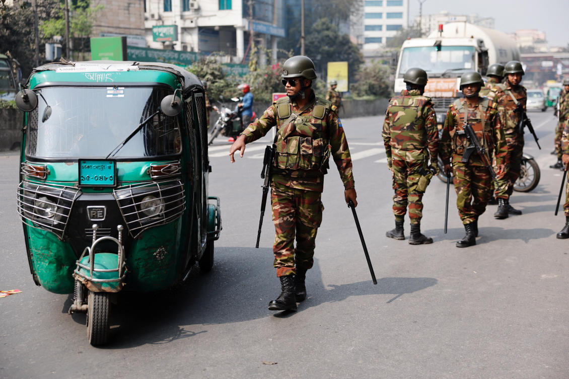 Members of the Bangladesh Army check vehicles at a checkpoint, a day ahead of the national election in Dhaka, Bangladesh, February 11, 2026. (REUTERS)