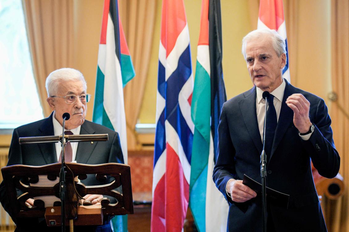 Norway's Prime Minister Jonas Gahr Store (R) and Palestinian President Mahmoud Abbas adress the press after a meeting in Oslo Wednesday. (AFP)