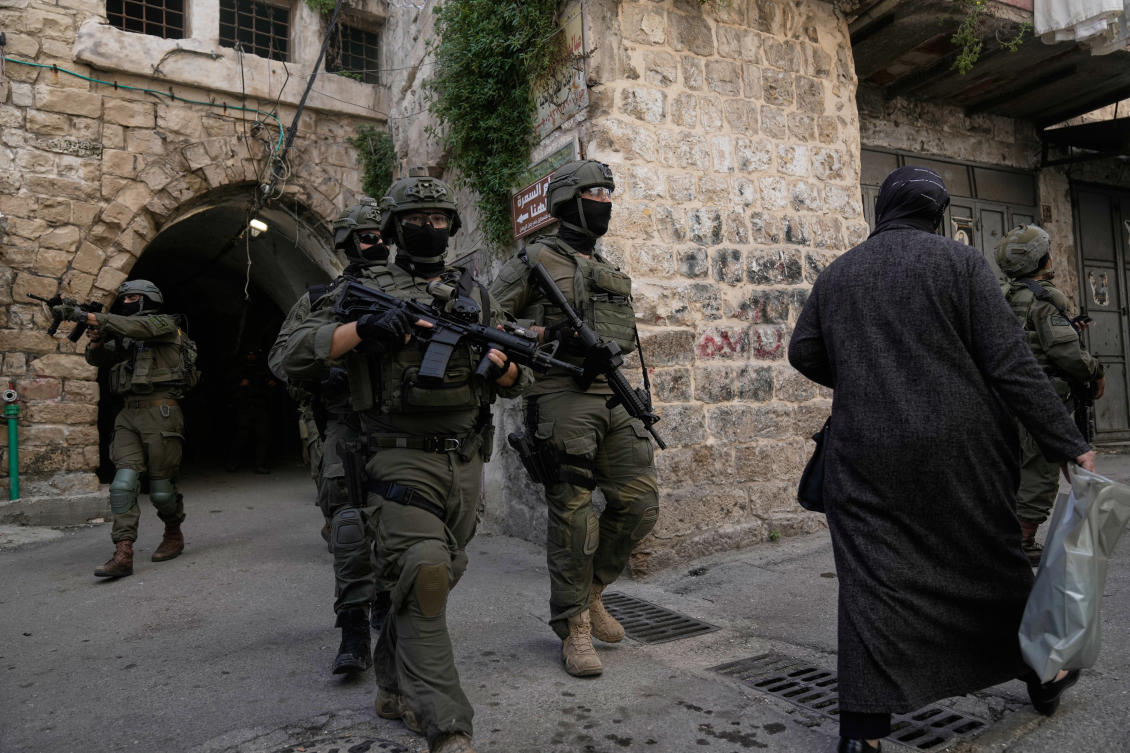 Israeli soldiers during an army raid in the West Bank town of Nablus on Wednesday. (AP)