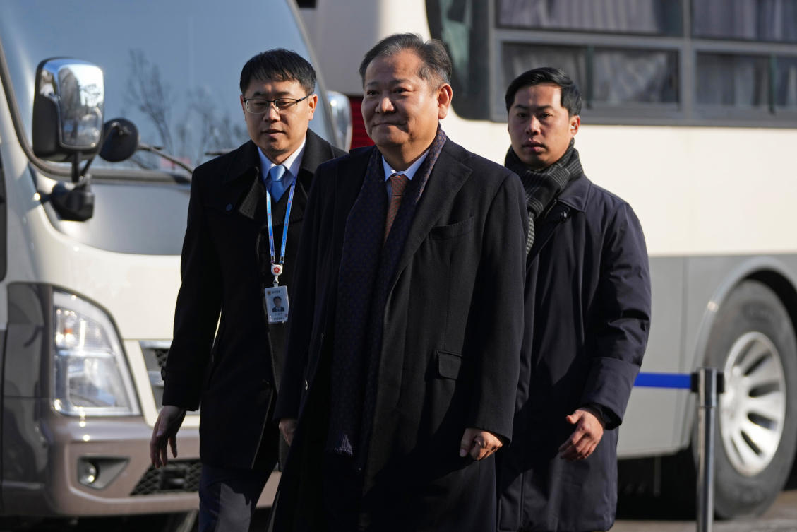 Former Interior Minister Lee Sang-min, center, was found guilty of taking part in an insurrection by relaying instructions to police and fire agencies to cut power and water to media outlets. (AP)