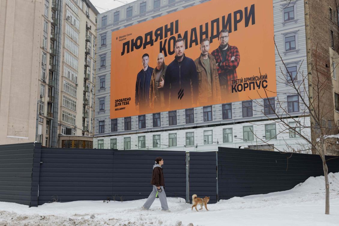 Above, a Ukrainian Army recruiting billboard in Kyiv. Britain on Thursday pledged hundreds of millions of dollars in air defenses for Ukraine. (AFP)