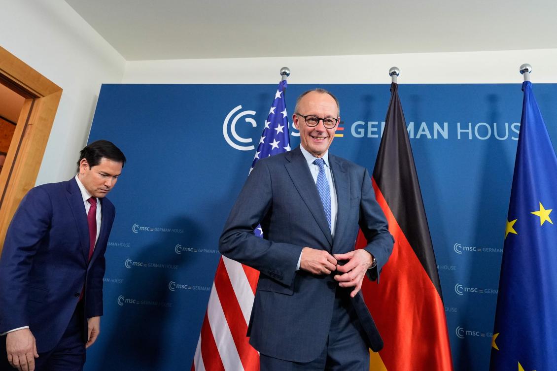 German Chancellor Friedrich Merz (R) and US Secretary of State Marco Rubio arrive for a bilateral meeting on the sidelines of the Munich Security Conference. (AFP)