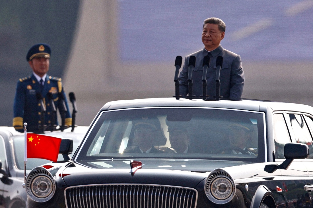 Chinese President Xi Jinping stands in a car to review the troops during a military parade to mark the 80th anniversary of the end of World War Two, in Beijing, China. (Reuters)