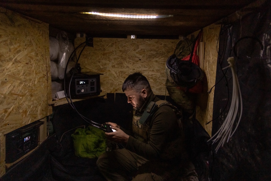 A photo dated 2023 shows a Ukrainian drone-operator of the 65th Mechanized Brigade flying a drone to locate Russian army positions, near the frontline village of Robotyne, in the Zaporizhzhia region. (AFP)