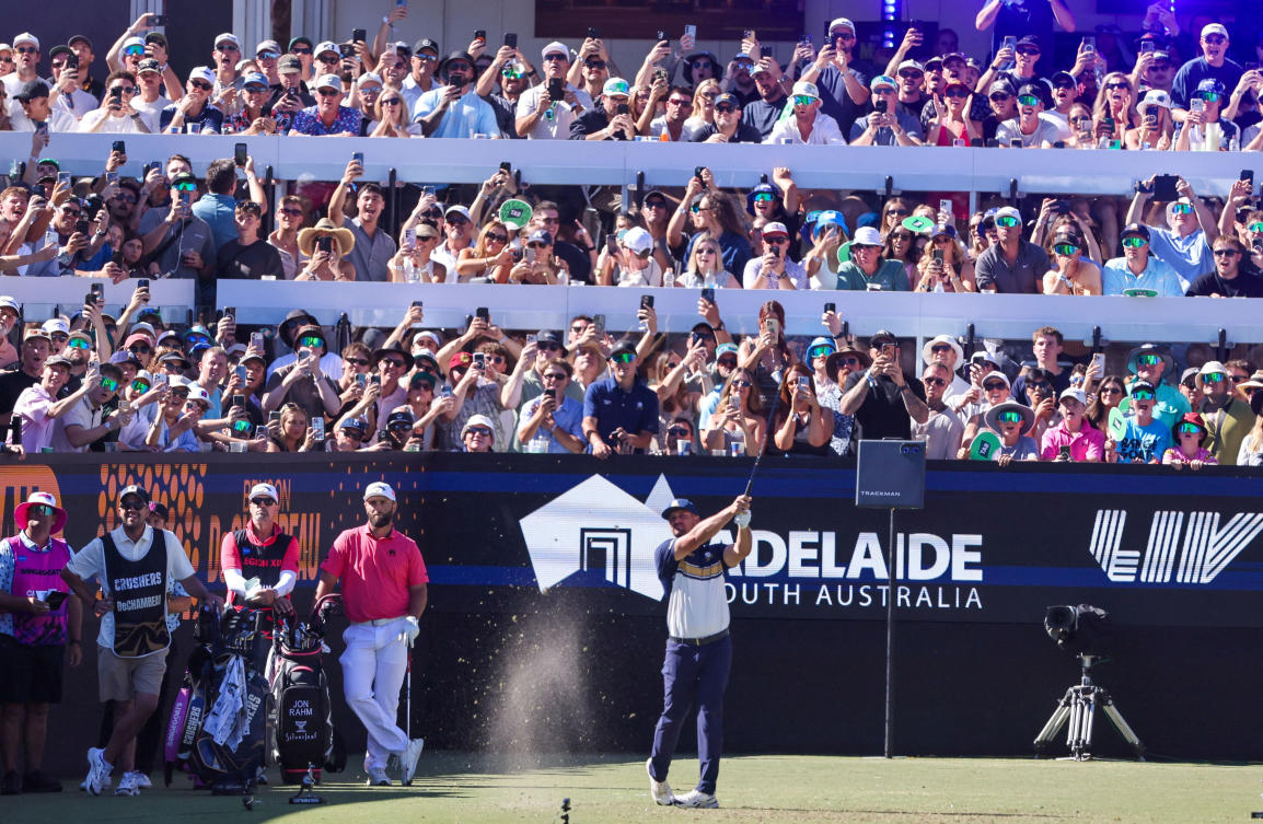 The Grange Golf Club, Adelaide, Australia - February 14, 2026 Crushers GC's Bryson DeChambeau in action during the third round as Legion XIII's Jon Rahm looks on Matt Turner/AAP Image via REUTERS