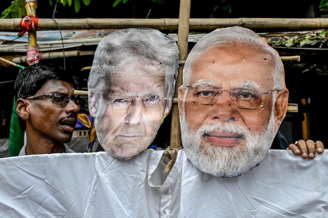 Congress activists carry an effigy of US President Donald Trump and Indian Prime Minister Narendra Modi as they protest against the Indo-US trade deal, after the former imposed 25 percent tariffs on Indian goods, during a demonstration in Kolkata on August 1, 2025. (FILE/AFP)