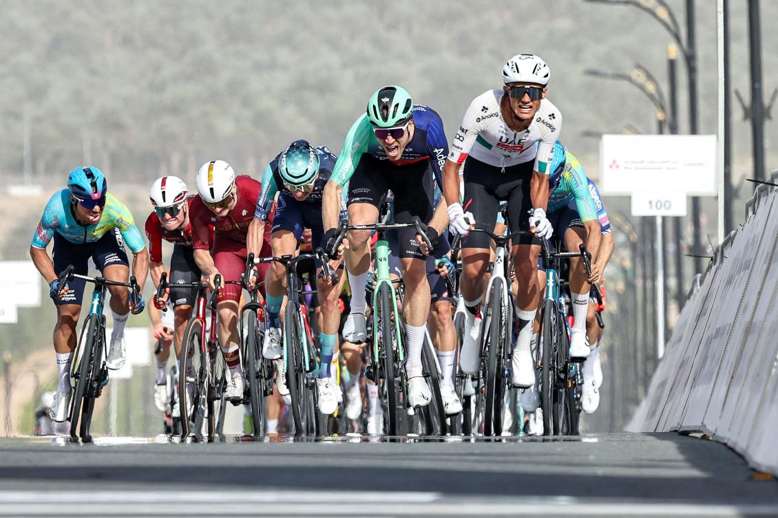 Mexican youngster Isaac Del Toro powered to victory in a sprint finish in a shortened opening stage of the UAE Tour on Monday. (AFP)