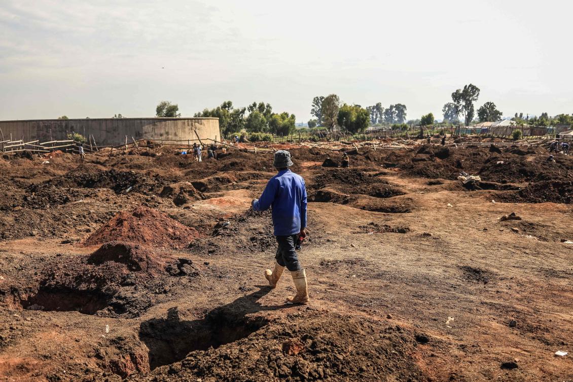 Above, artisanal miners work in a patch of land outside Springs, Ekurhuleni on Feb. 18, 2026. An industry report said that 41 miners died in mining accidents in South Africa last year. (AFP)
