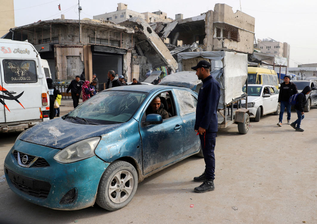 A Hamas Police officer directs traffic in Gaza City, Jan. 28, 2026. (Reuters/File)
