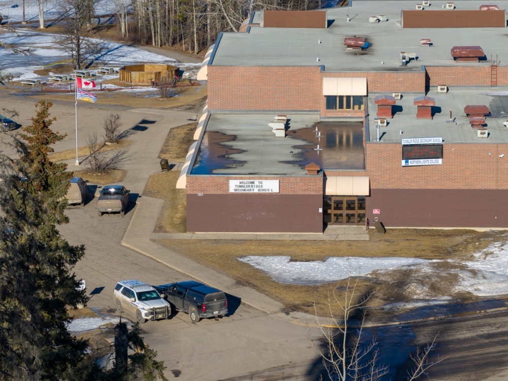 Aerial view of the middle school and high school building where a shooting took place, leaving at least nine people dead in the small town of Tumbler Ridge, British Columbia, on February 11, 2026. (AFP)